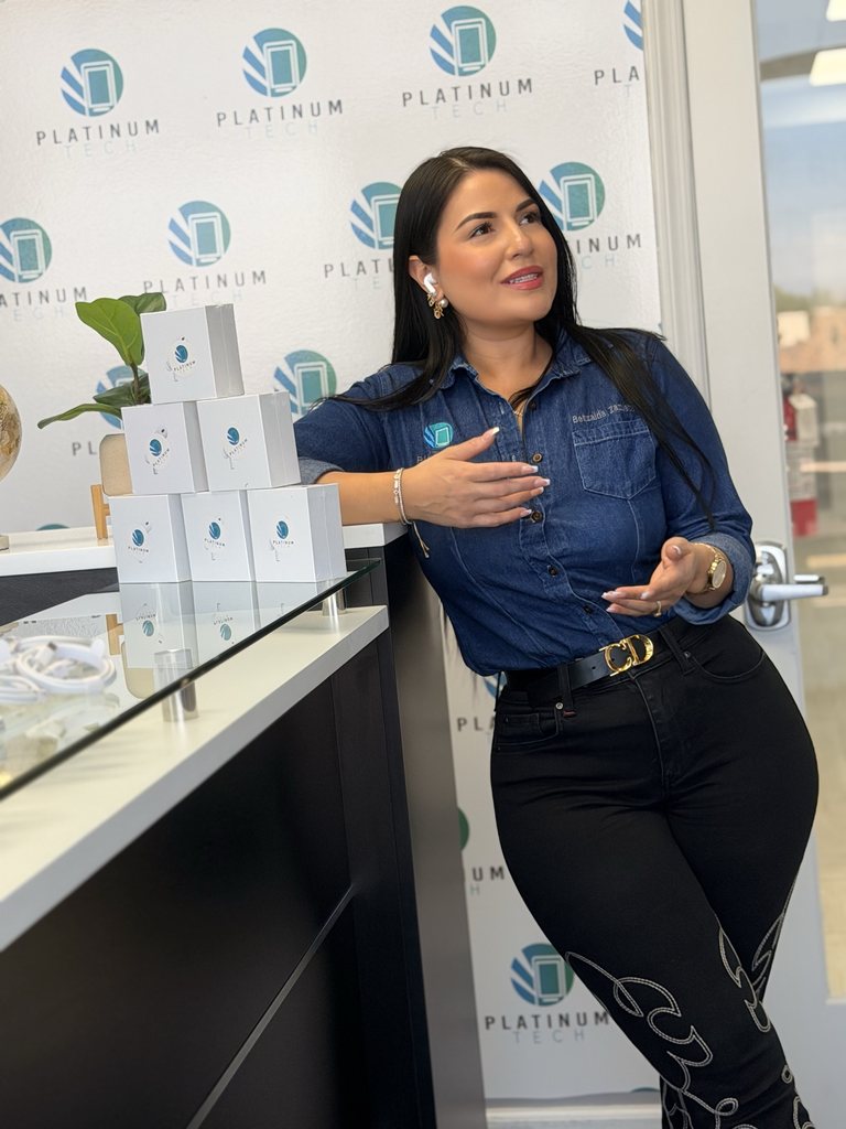 Betzy inside the Platinum Tech showroom in Phoenix